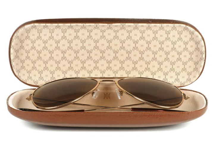 Patterned glasses case with sunglasses